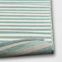 5'x7' Narrow Wornstripe Rectangular Woven Outdoor Area Rug Turquoise Blue - Threshold™ -Home Decor Store GUEST de24221f eb98 4b3d 8215 da45667ce98e