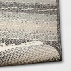 7'x10' Striped Tapestry Rectangular Woven Outdoor Area Rug Gray - Threshold™ -Home Decor Store GUEST eac675a2 60ff 4961 93cc 44df0a57d3d8